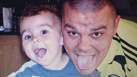 An old photo of Martin Cosser with his son Charlie.