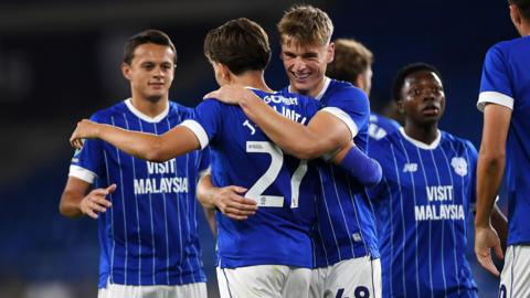 Cardiff players celebrate a Joel Colwill goal