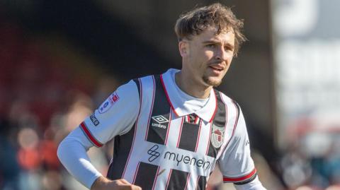 Luca Barrington in action for Grimsby Town