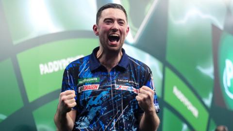 Luke Humphries celebrates his victory over Gabriel Clemens