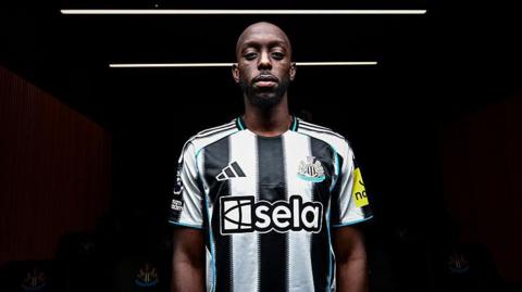 Yoane Wissa poses for photographs at the Newcastle United training ground after signing for the club on 1 September, 2025