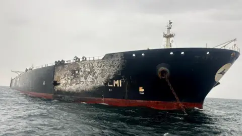 amage to the Kuwait-flagged Al-Salmi crude oil tanker, following a reported strike, amid the U.S.-Israeli conflict with Iran