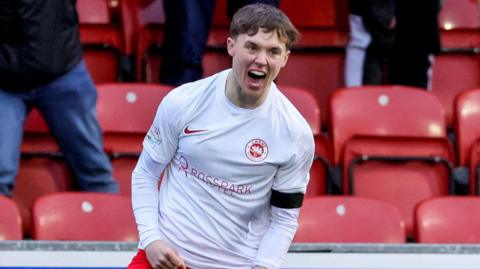 Matthew Lusty celebrates