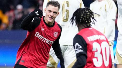 Florian Wirtz celebrates after scoring for Bayer Leverkusen