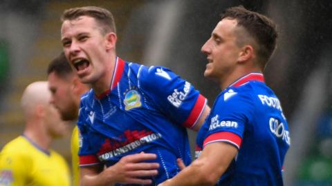 Kyle McClean celebrates scoring Linfield's second goal against Dungannon