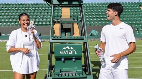 Emma Raducanu and Carlos Alcaraz holding bottles of water