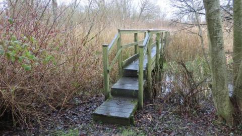 Wooden bridge at Withymead Nature Reserve.