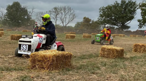 Racers riding their mowers