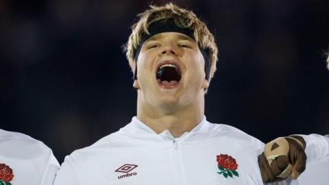 Henry Pollock singing England's national anthem