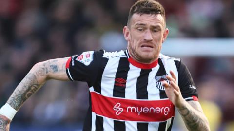 Andy Cook in action for Grimsby Town in the 2025-26 season