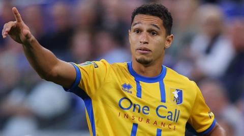 Kyle Knoyle in action for Mansfield Town