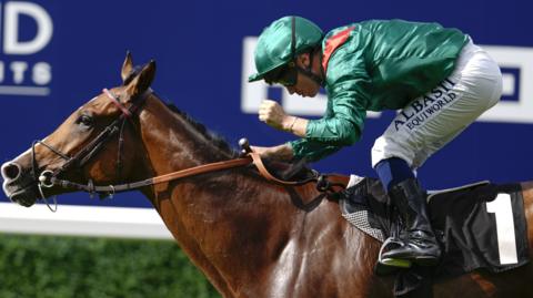 Calandagan, ridden by Mickael Barzalona, winning the Champion Stakes at Ascot