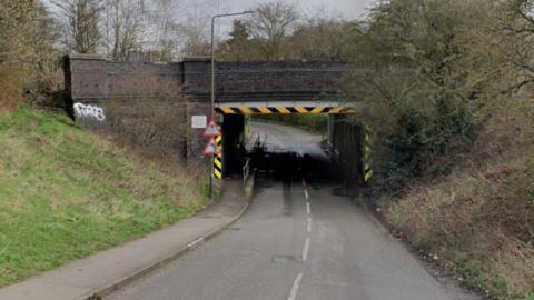 Street view of a bridge on Milnhay Road in Langley Mill, Derbyshire.