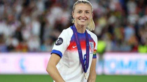 England captain Leah Williamson holds the European Championship trophy, 2025..