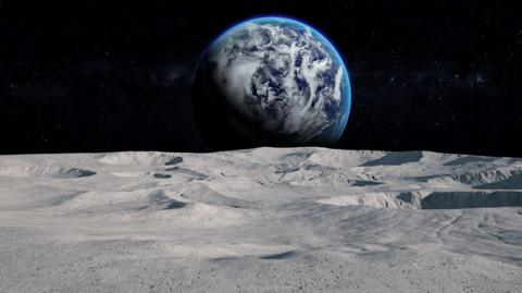 Digitally generated image of the Moon surface with distant Earth.