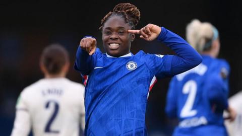 Chelsea's Sandy Baltimore celebrates