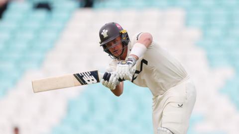 Jamie Smith playing an on-drive for Surrey at The Oval