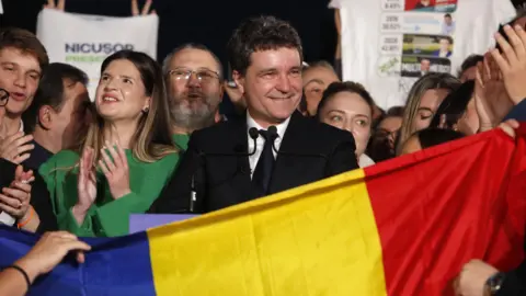 Bucharest mayor and independent presidential candidate supported by the Force of the Right (FD), delivers his speech after the first exit poll results are announced in Cismigiu Park, Bucharest, Romania, 18 May 2025