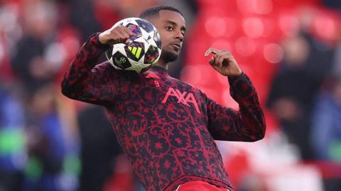 Alexander Isak warms up