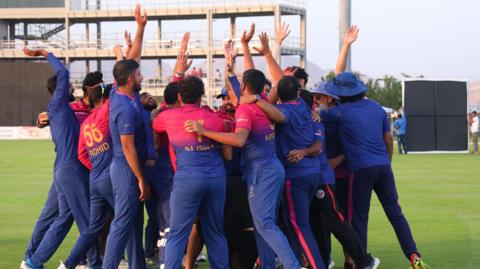 UAE players celebrate reaching the T20 World Cup