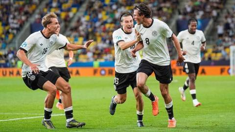 Germany celebrate their late winner against Italy Under-21s