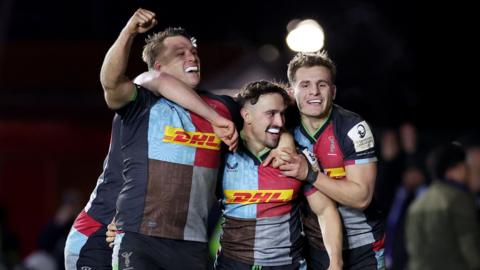 Harlequins players celebrate scoring a try against Stormers