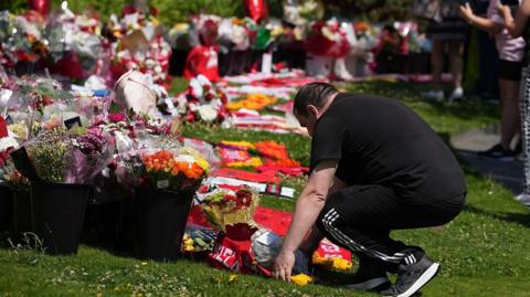 Fan laying flowers