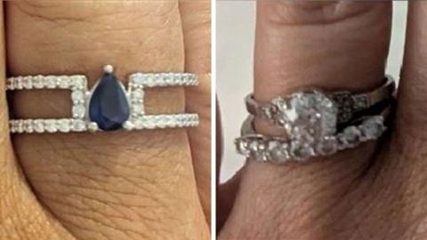 Two pictures of stolen rings.  On the first picture there is a a white gold band with diamonds inset and a teardrop sapphire sitting on the finger. On the second picture 2 rings are sitting on the finger, one white gold band with 1 carat diamond and smaller diamonds inset valued, and another is a white gold with seven diamonds inset in the band.