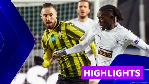 Kairat Almaty's Ofri Arad and Pafos' Domingos Quina compete for the ball 
