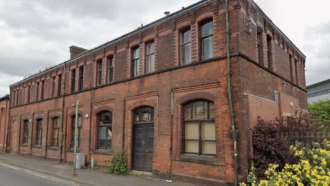 A redbrick industrial building formerly in use as a sawmill.
