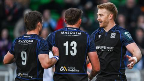 Glasgow Warriors celebrate Kyle Steyn's try against Dragons