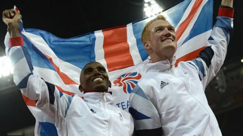 Mo Farah and Greg Rutherford celebrate their gold medals