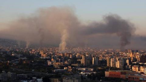 Smoke lingers over the skyline of southern Beirut after air strikes were carried out by the Israeli military overnight