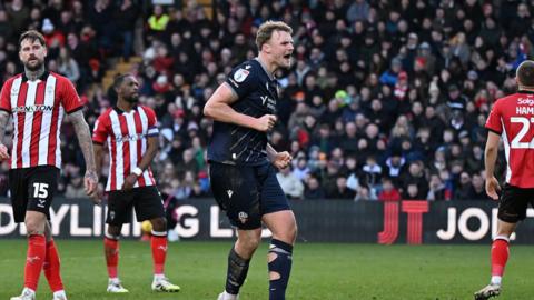 Sam Dalby celebrating his goal for Bolton Wanderers