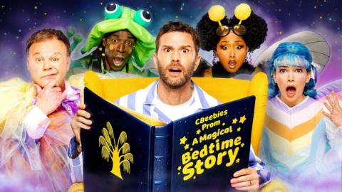 Joel Dommett is wearing pyjamas and looking shocked while reading a giant book labeled "CBeebies Prom A Magical Bedtime Story". A fairy, a frog, a bee and another magical creature all look over his shoulder looking shocked.