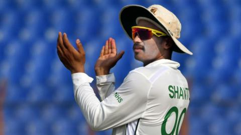 Bangladesh's Najmul Hossain Shanto encourages his side in the field
