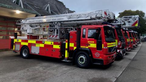 Fire trucks lined up outside the Douglas station