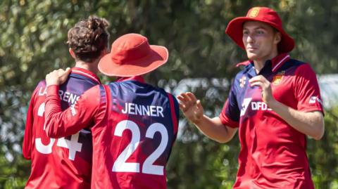 Jersey celebrate a wicket during their 50-over match against Kenya