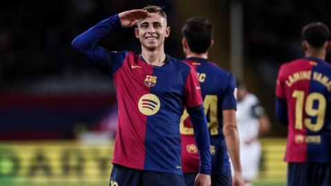 Fermin celebrates scoring for Barcelona against Valencia