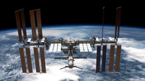 the iss floating above earth