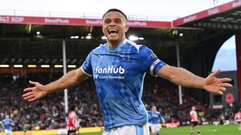 Carlton Morris celebrates scoring for Derby at Sheffield United