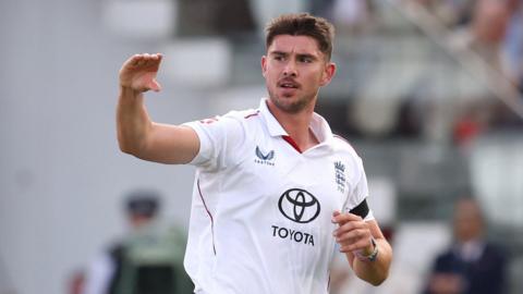 England fast bowler Josh Tongue celebrates taking a wicket