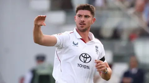 England fast bowler Josh Tongue celebrates taking a wicket