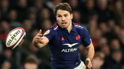 Antoine Dupont reaching the ball in France's defeat by England