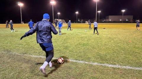 Marske United FC making a cross