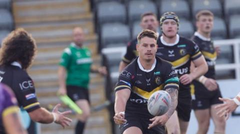 Jesse Dee of York RLFC Knights passes during a BETFRED Championship match