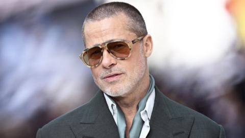 Head and shoulders of Brad Pitt at the F1 film premiere.