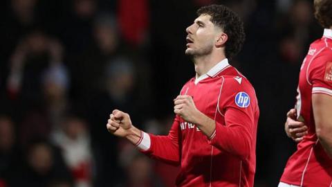 Wrexham's left wing-back Liberato Cacace