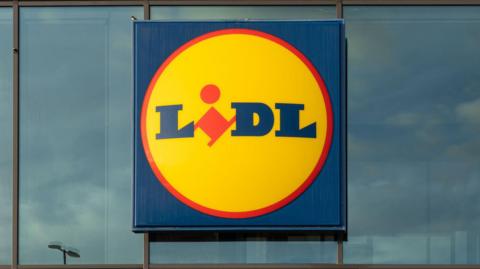 A general view of Lidl's logo fixed to a supermarket.