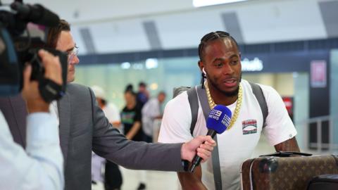 Jofra Archer is interviewed after landing in Australia